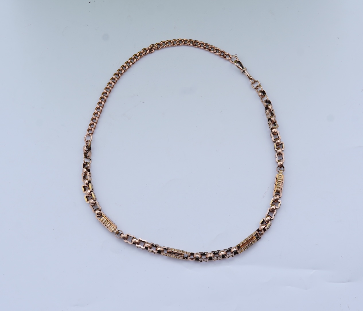 A gold necklace, late 19th century composite